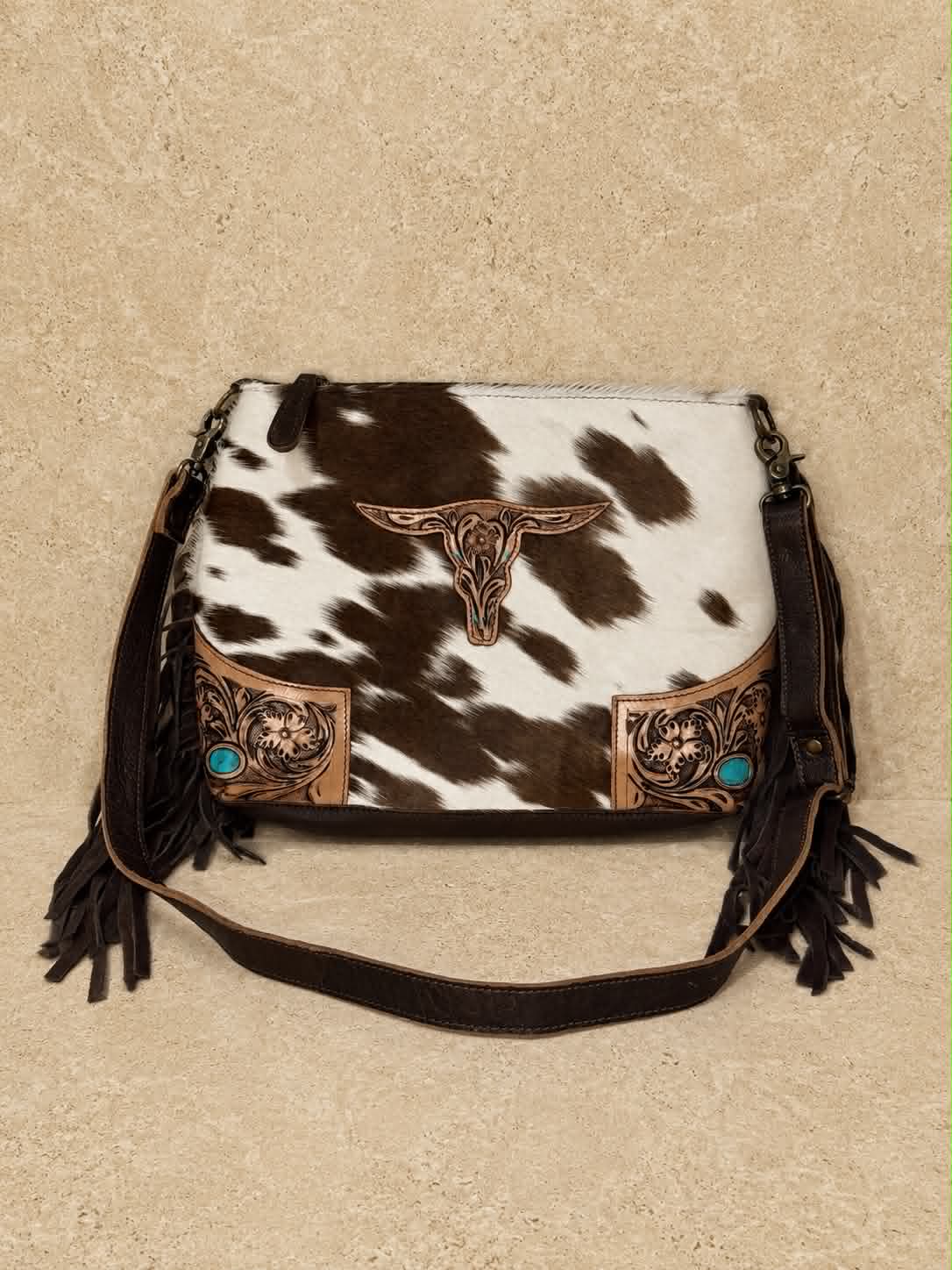 Brown And White Cowhide Tasselled Handbag With Bull Skull A Pops Of Blue