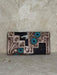 Turquoise Geometric Tooled Black & White Cowhide Leather Clutch