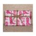 Clay & Colour Gift Wrap - Packaged product with pink cowboy boot pattern on a brown background
