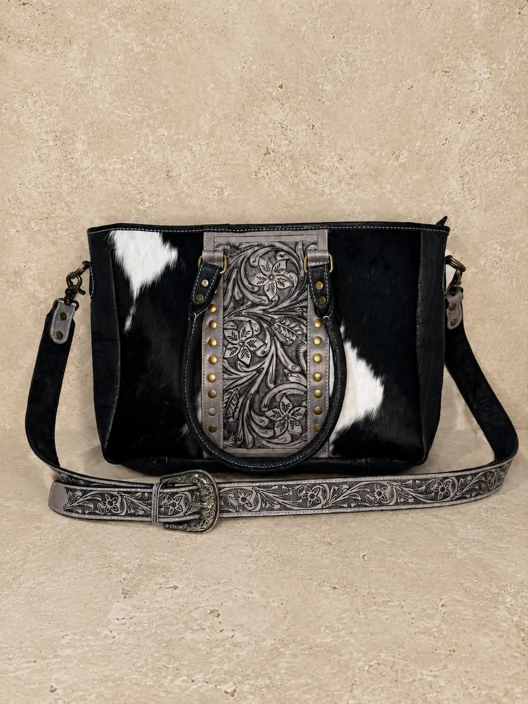 Large Black And White Cowhide Handbag With Tooled Floral Middle